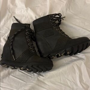 Sorel Black Wedge Boots with Rugged Soles